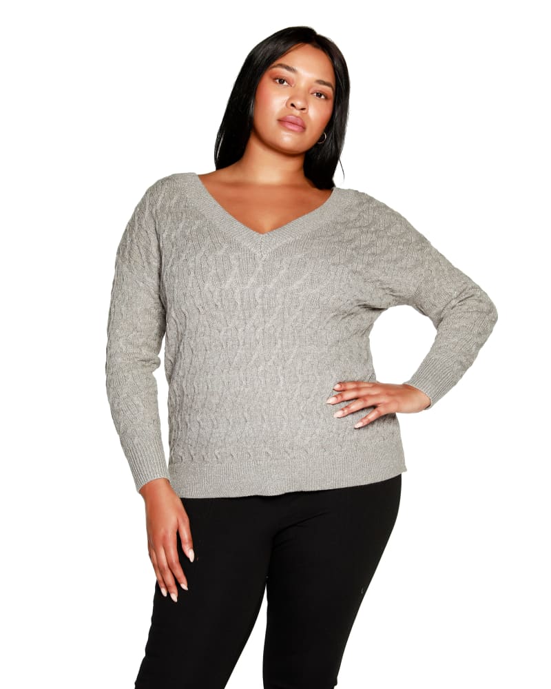 Front of a model wearing a size 2X Plus Size Lurex Cable Double V-neck Sweater in Heather Grey/Silver by Belldini. | dia_product_style_image_id:319490